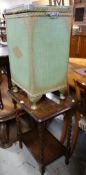 A Lloyd Loom linen basket & a barley-twist two-tier occasional table