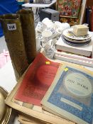 A pair of relief-decorated 'trench-art' brass artillery shell vases & a parcel of sheet music