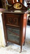 Early twentieth century carved & mirror backed small cabinet with glass door