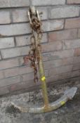 A vintage cast iron ship's anchor (outside)