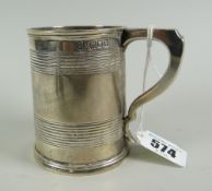 A silver antique mug with rib decorated, hallmarked for London 1897 by George Jackson & David