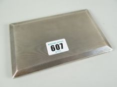 A machine-turned silver cigarette-case with gilded interior, Birmingham 1934, 9.3oz