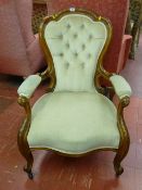 Medium sized button upholstered spoonback armchair