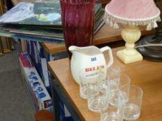 Set of six Bells Scotch whisky tumblers, Bells Scotch whisky jug and a cranberry glass vase