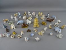 Good collection of Wade Whimsies including animal sets, Disney characters from 'Lady and the Tramp',