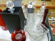 Boxed Thomas Webb square based decanter and stopper, three other square based decanters, claret
