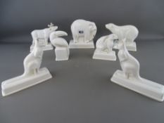 Coalport ceramics - seven white and gilt decorated animal figurines (one repaired)