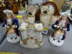 Pair of Staffs figures, Staffs house and a pair of pug dogs
