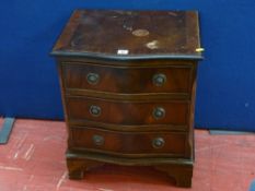 Small serpent front three drawer chest