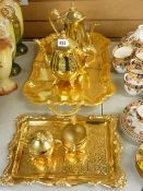 Gold plated four piece tea service on a similar tray and another large two handled gold plated