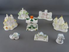 Coalport ceramics - six various cottages, a windmill snuffer etc