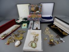 Plastic basket of vintage and later costume jewellery and a quantity of cased similar