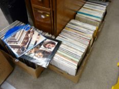 Three boxes containing large quantity of LP records, various genres including Elvis, The Beatles