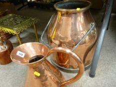 Copper milk churn with brass rim and a beaten copper water jug