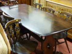 Ercol dark wood table and six chairs