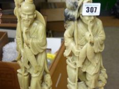 Pair of Oriental soapstone or similar figures