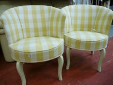 Two check upholstered tub chairs