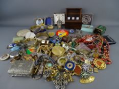 Tin and wicker basket of vintage and later costume jewellery, compacts and other collectables