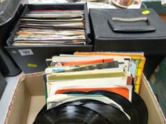 Two cases and a shoebox containing vinyl 45rpm records