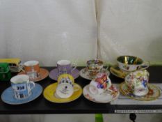 Four Wedgwood 'Grand Tour' collection series coffee cans and saucers, Royal Worcester 'Cafe Blake