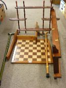 Parcel of treen - hanging racks, chess board, sticks etc