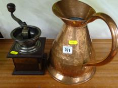 Beaten copper vintage water jug and a coffee grinder