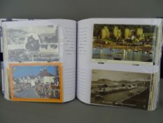 Postcard album - Wales including North Wales street scenes, vehicles, beaches and an interesting