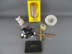 Beswick model of Beatrix Potter 'Samuel Whiskers', a seated kitten, a Wedgwood 'Mrs Tiggywinkle'
