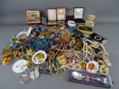 Box and small wicker basket of vintage and later costume jewellery