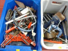Two plastic tubs of various clamps and vices