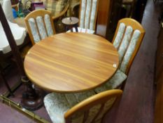 Modern circular drop leaf dining table and four chairs