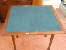 Modern foldover baize lined card table on tapered supports