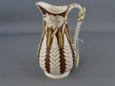 Cobridge ware semi-glazed fern patterned jug with registration mark to the base