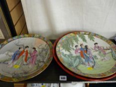 Pair of Famille Vert Geisha girl decorated display plates etc