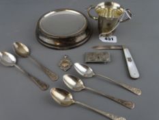 Circular silver shallow dish on a loaded base, a small two handled silver cup with hawk head handles