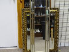 Fine gilt framed bevelled wall mirror, a mid Century wall mirror and a modern narrow mirror, 108 cms