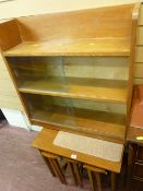 Mid Century nest of four tables and a three shelf bookcase with glazed sliding doors
