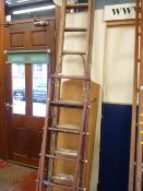 Wooden two section ladder and a vintage metal stepladder