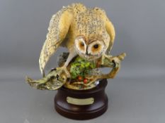 Royal Doulton matt finish barn owl, modelled by Tongue on a wooden stand