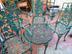 Garden table set of four chairs and table with leaf design pattern