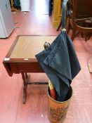 Modern tooled leather top single drawer table and a metal embossed stickstand with contents