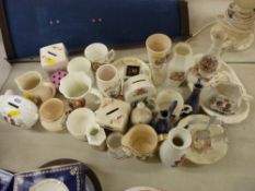 Large parcel of mixed commemorative ware including money boxes, vases etc