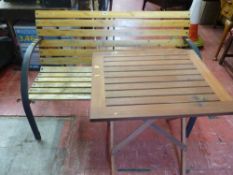 Modern wood and metal garden bench and a folding wooden garden table