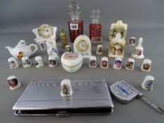 Two red tinted stoppered bottles, a small parcel of china thimbles and other items of Charles &