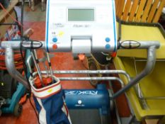 Reebok treadmill and a small quantity of golf clubs in bag E/T