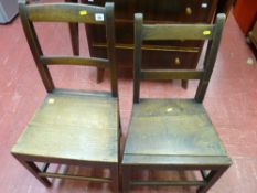 Two non-matching farmhouse chairs