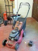 Mountfield RS100 petrol lawnmower (possibly self driven) and a petrol can