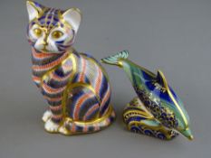 Royal Crown Derby seated cat paperweight and a Royal Crown Derby baby bottlenose dolphin