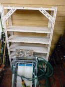 Metal shelving unit, wooden stepladder, deckchairs etc