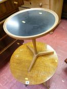 Small circular occasional table with black insert top and tripod feet designed by Hans C Andersen of